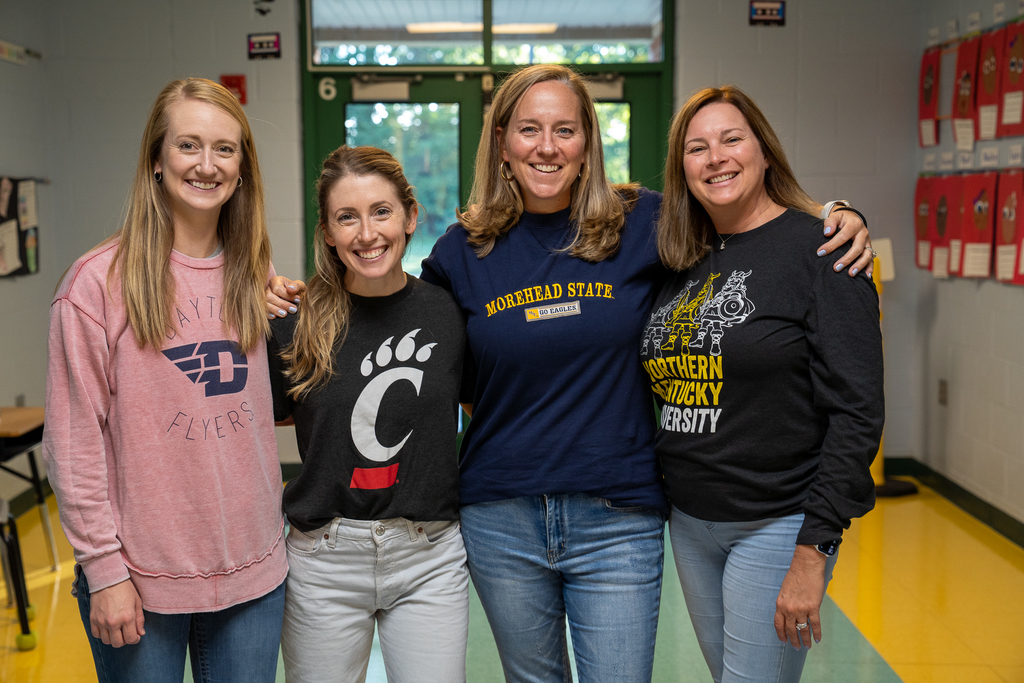 Group Photo of Women. From Left to Right: Dayton Flyers, UC, Morehead State & Northern Kentucky
