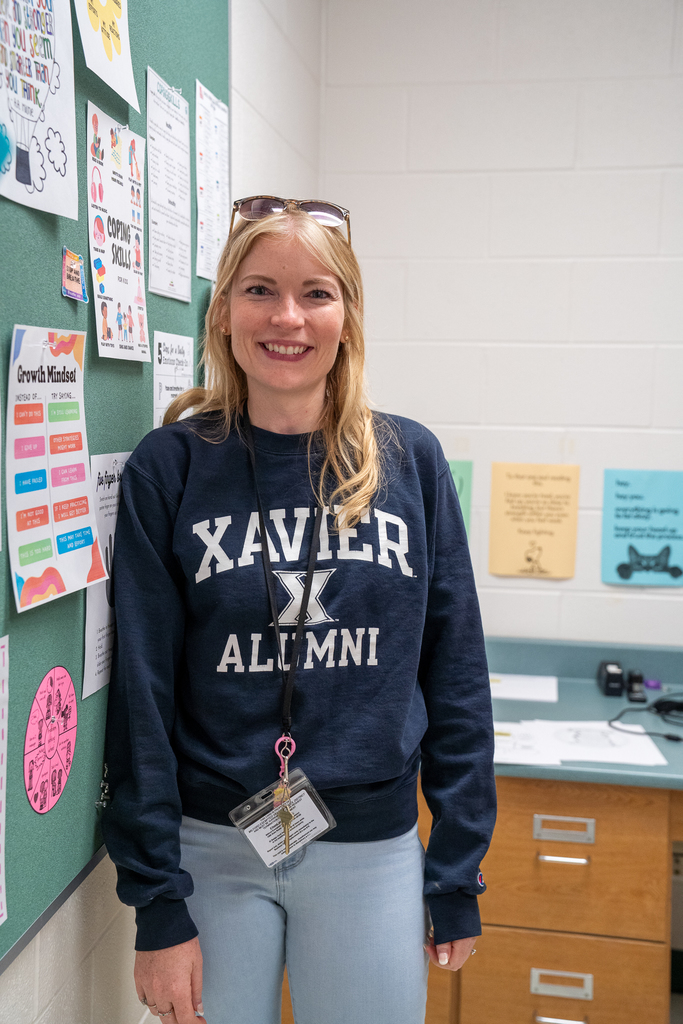 Woman weaing Xavier Alumni Sweatshirt