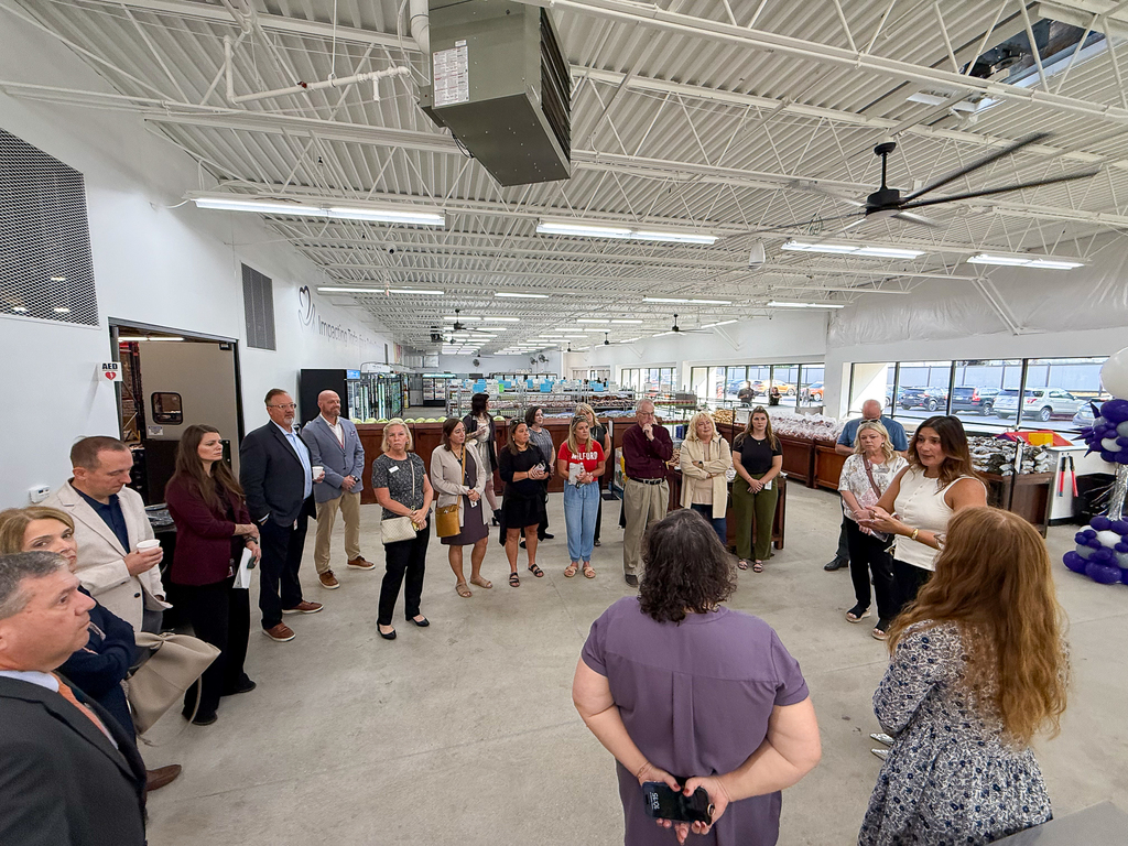 A crowd of people in a supermarket