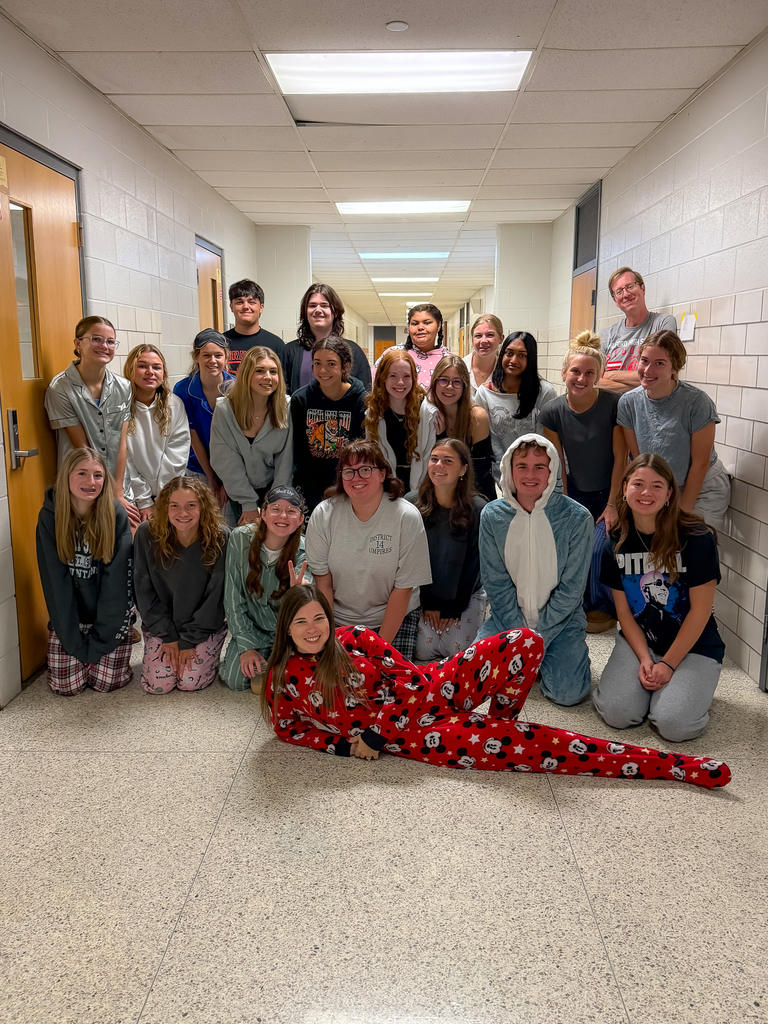 Group photo of kids all wearing pj's 