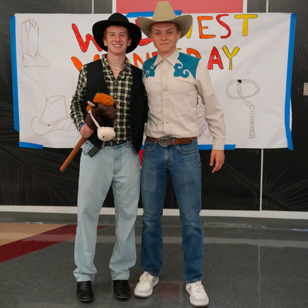 Two high school boys wearing cowboy outfits