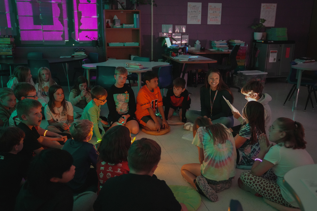 Group of students smiling in a circle