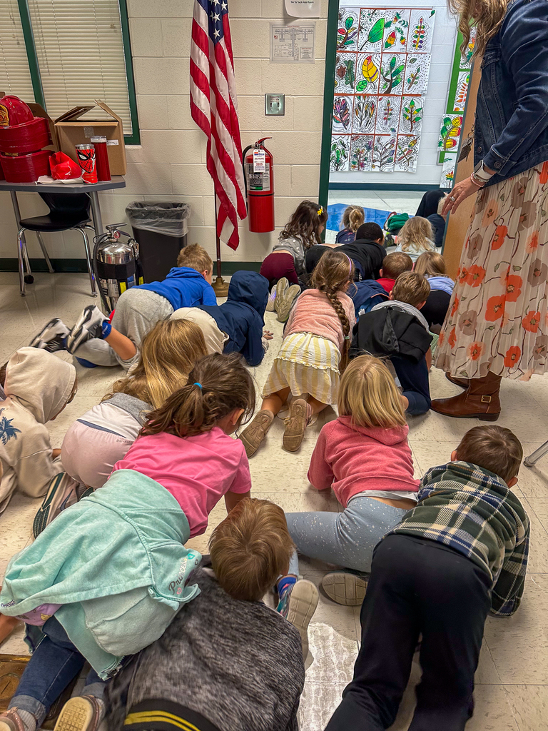 Kindergarteners crawling