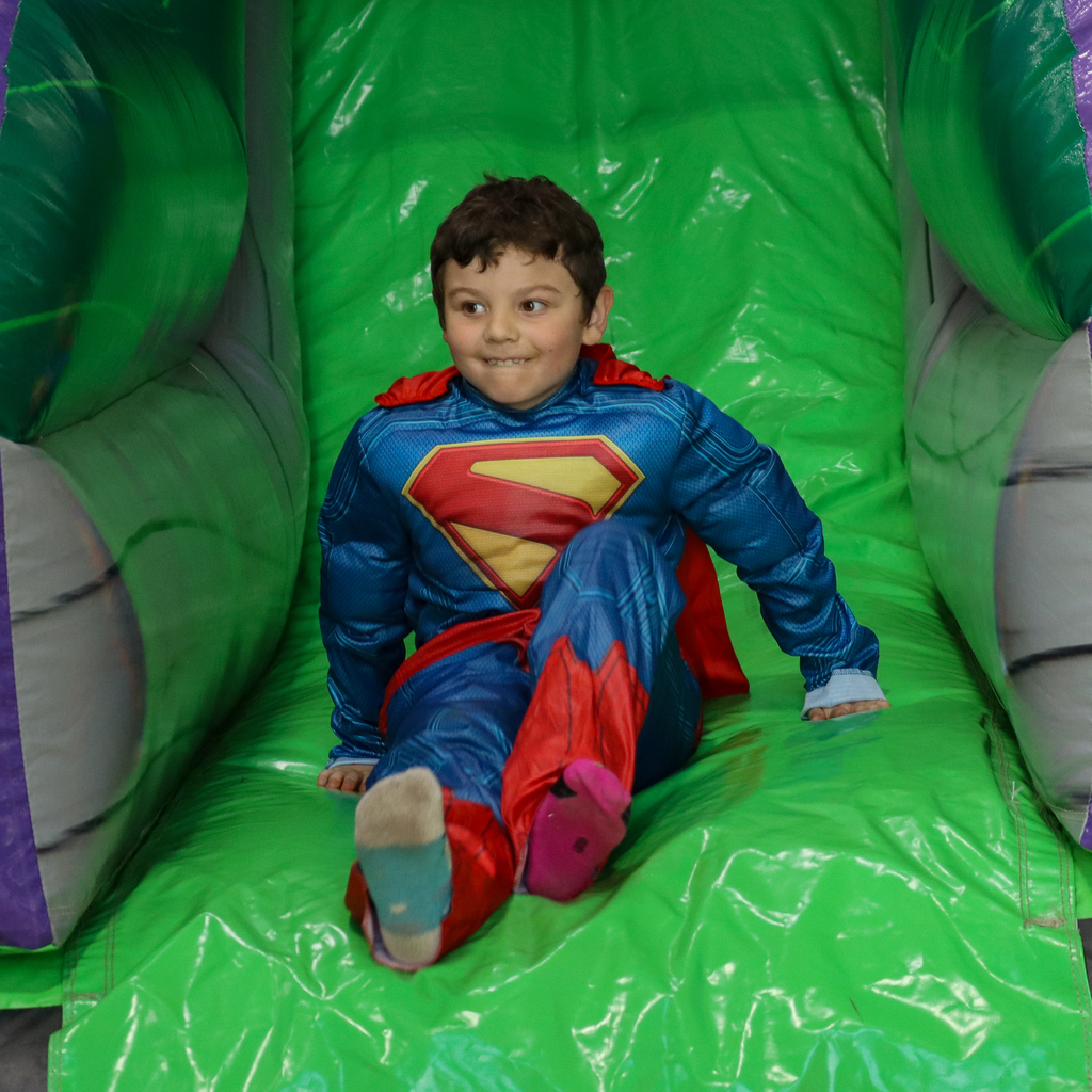 A student in a superman costume