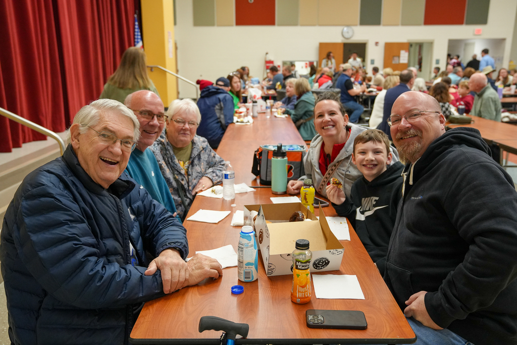 A family gathered at a table