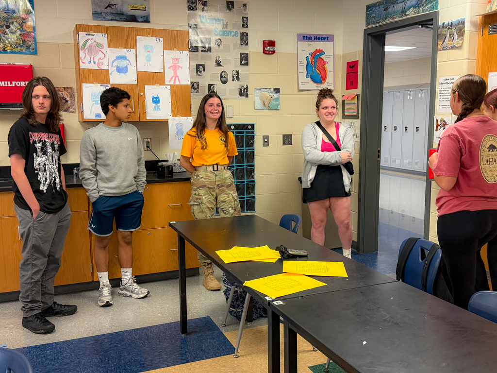 A group of students standing around 
