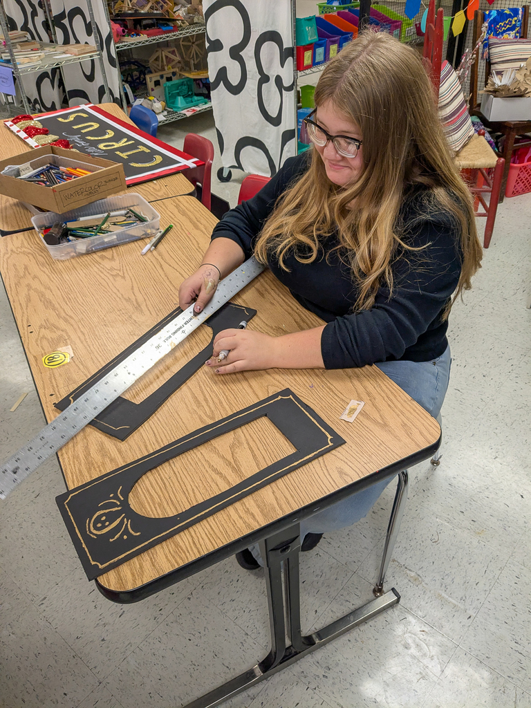Students creating a circus costume