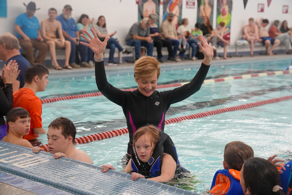 Woman holding hands up