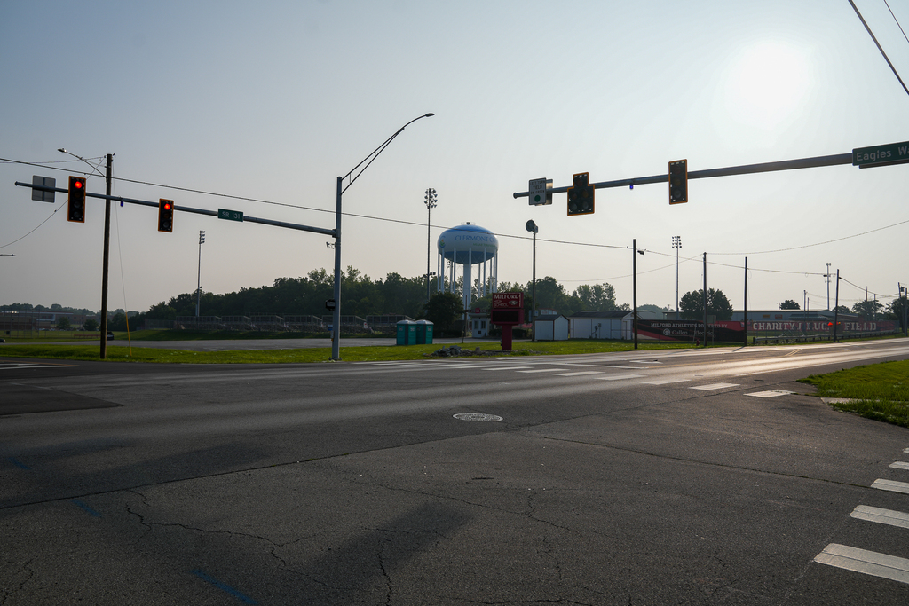 Wide view of the new signalized intersection at State Route 131 and Eagles Watch Way in front of Milford High School and Charity J. Lucas Field.