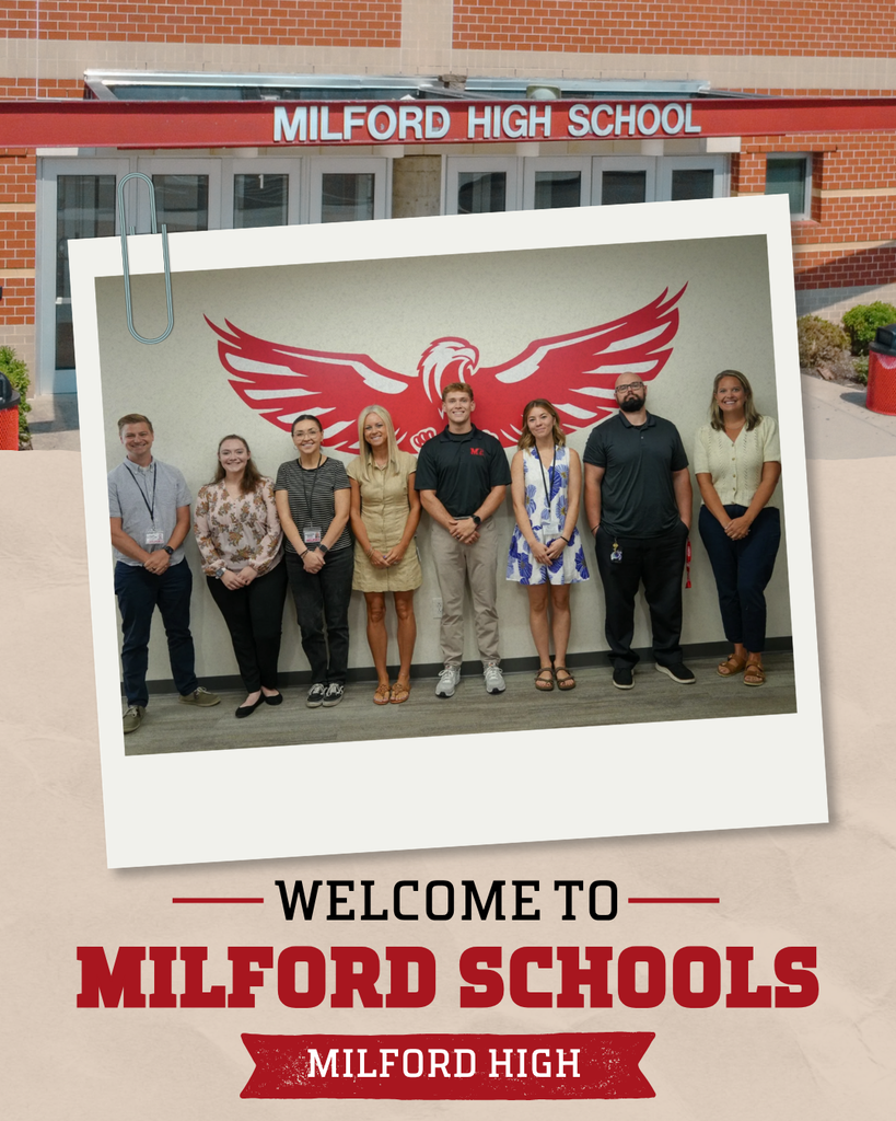 a polaroid of a bunch of new teachers standing in front of a red eagle. Behind it is paper saying "Wlecome to Milfod Schools - Milford high" with the milford high school image above