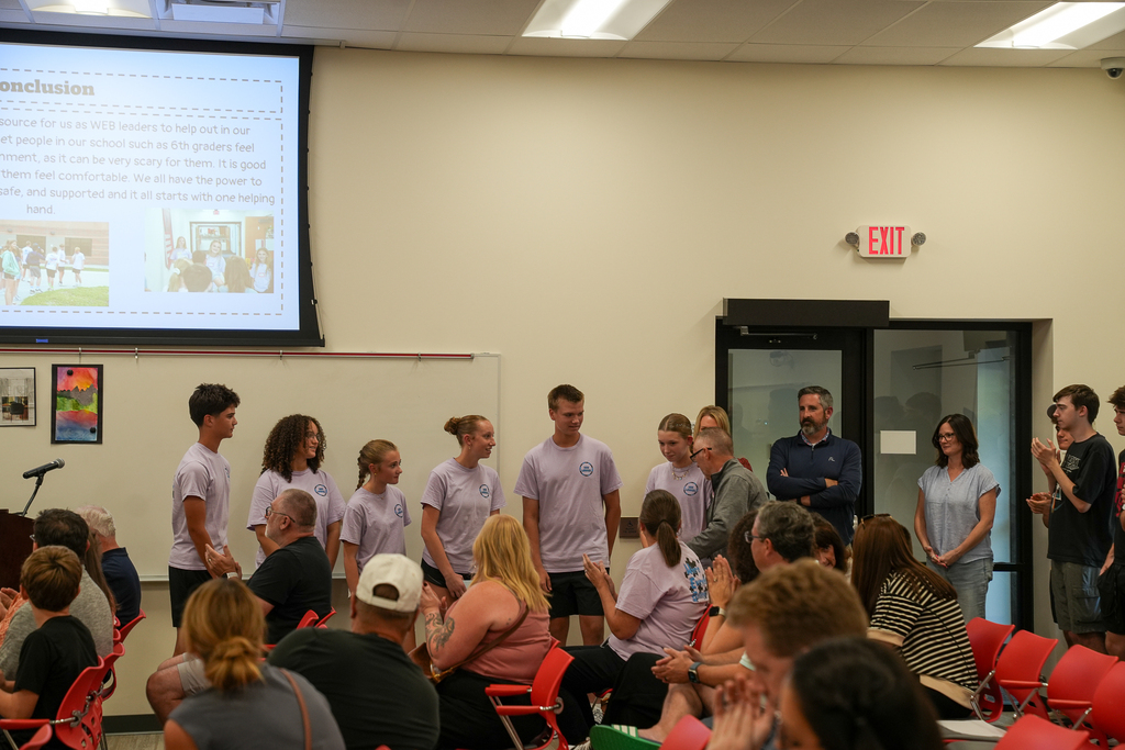 Milford Middle School WEB leaders receive applause from attendees after presenting about the student leadership program to the Board of Education.