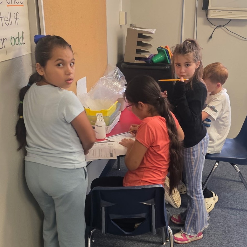 4th graders on the move—collecting and recording temperature observations like real scientists!