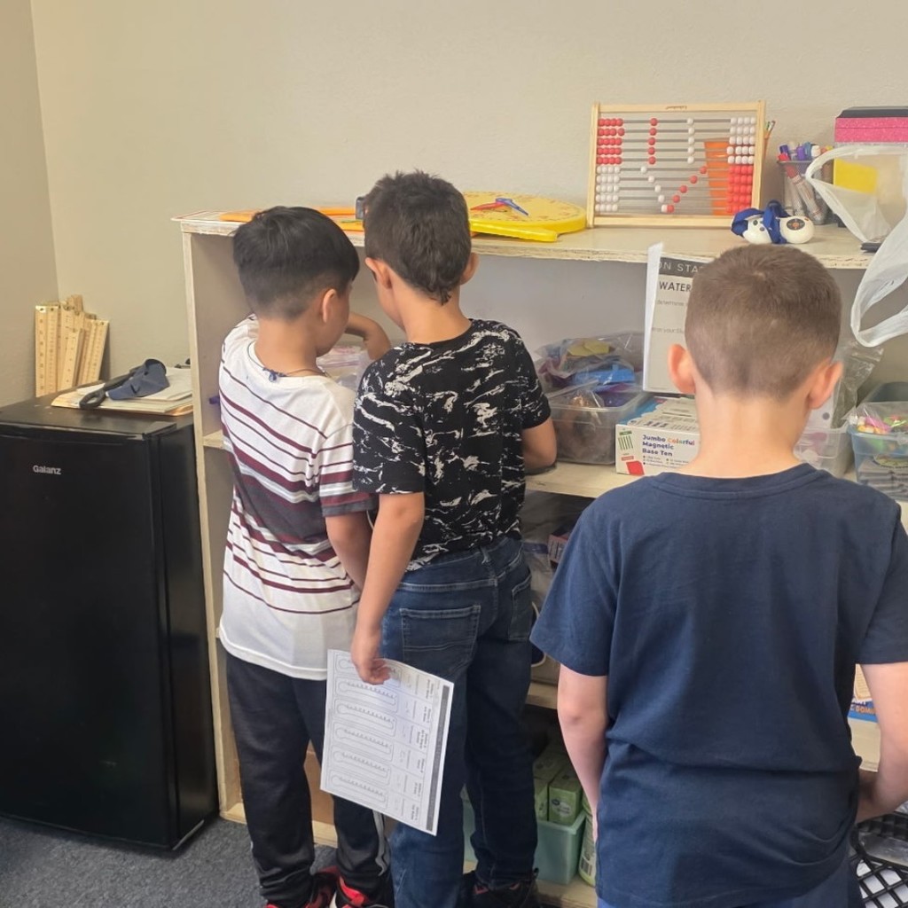 4th graders on the move—collecting and recording temperature observations like real scientists!