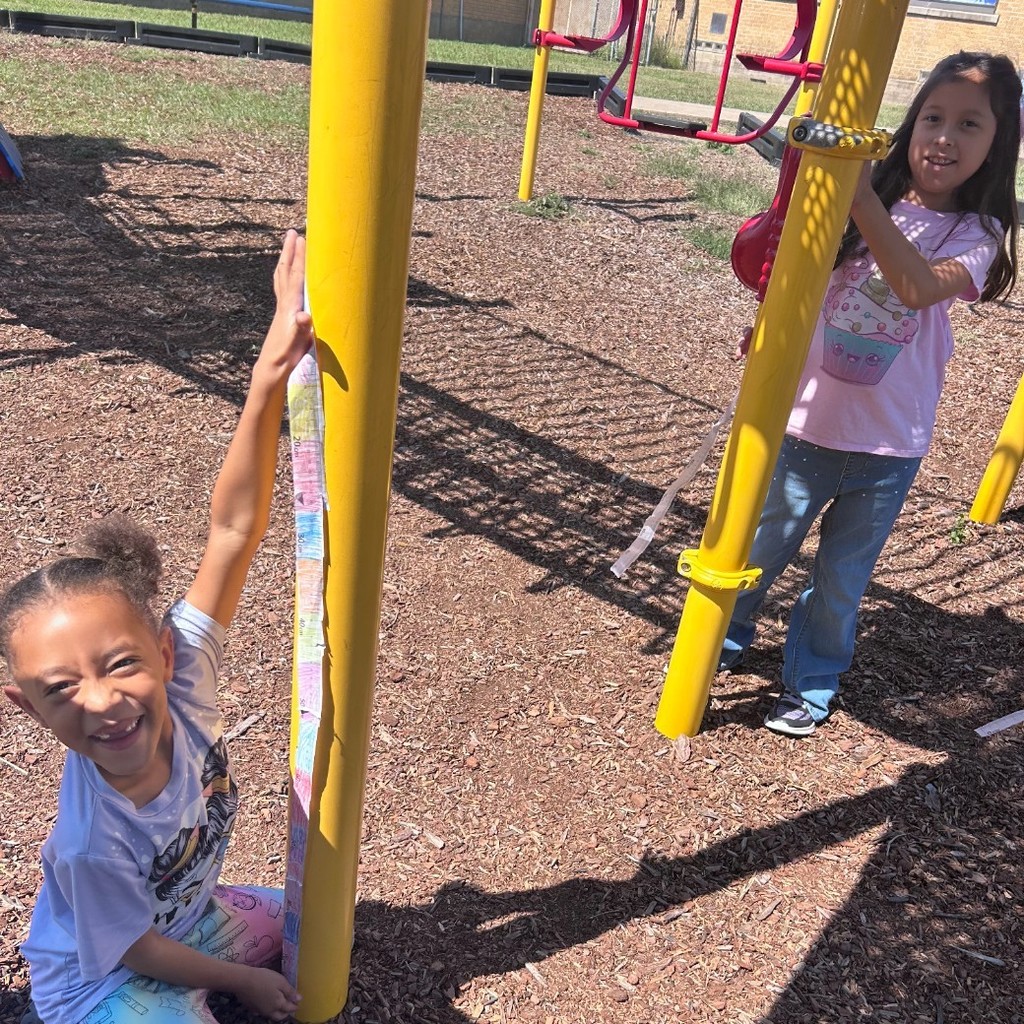 Making meter sticks and measuring the playground in 2nd grade!