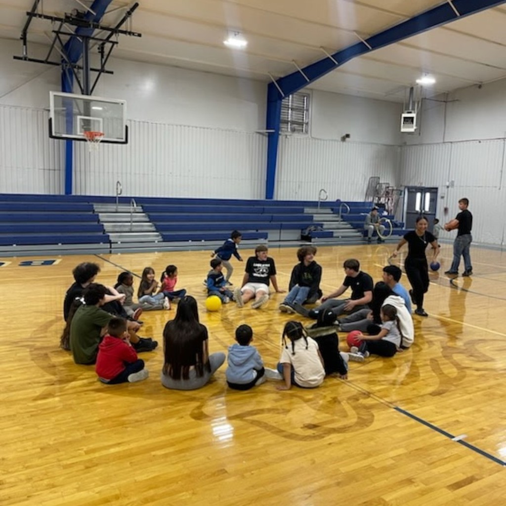 Today we had partner PE with Coach Turner’s 11th-grade psychology class. They came over to interact with our Pre-K students, and it went really well!
