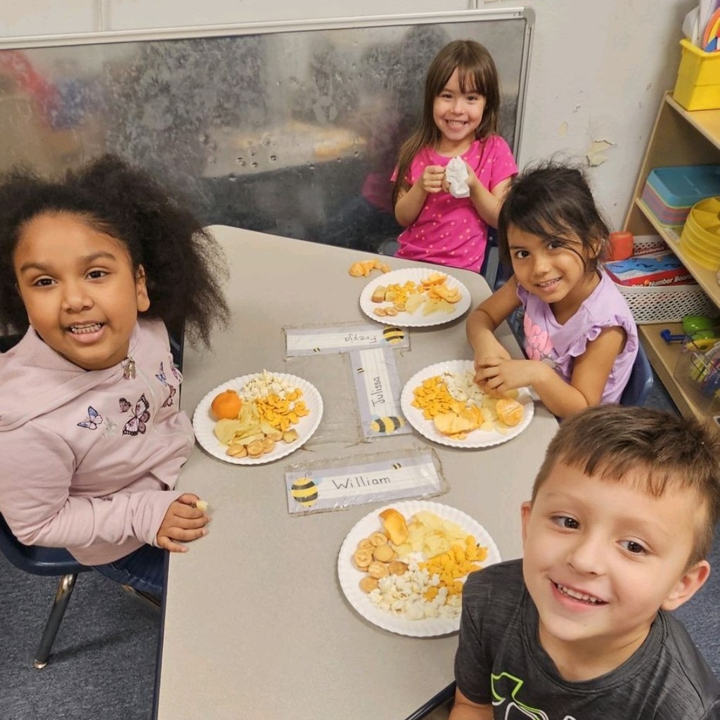 Our Pre-K Bulldogs had their very own Plymouth Potluck today! 🦃📚
After learning about the very first Thanksgiving celebration and the foods shared at that historic feast, our littles got to enjoy some fun “symbolic snacks” of their own:

✨ Goldfish to represent the fish eaten
✨ Dried berries to represent wild fruits
✨ Ruffles to represent mashed potatoes
✨ Nilla Wafers to represent the desserts enjoyed
…along with plenty of other tasty treats!

It was the perfect blend of learning, history, and yummy fun for our tiniest Bulldogs! 💙🐾