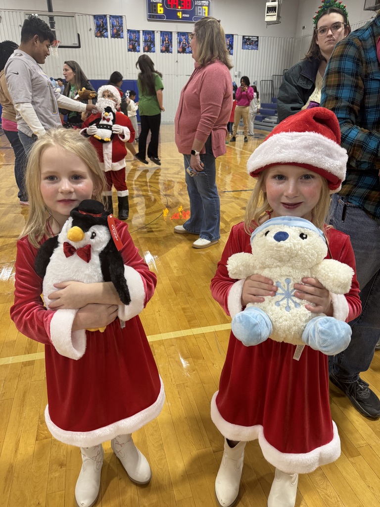 Child with stuffed animals