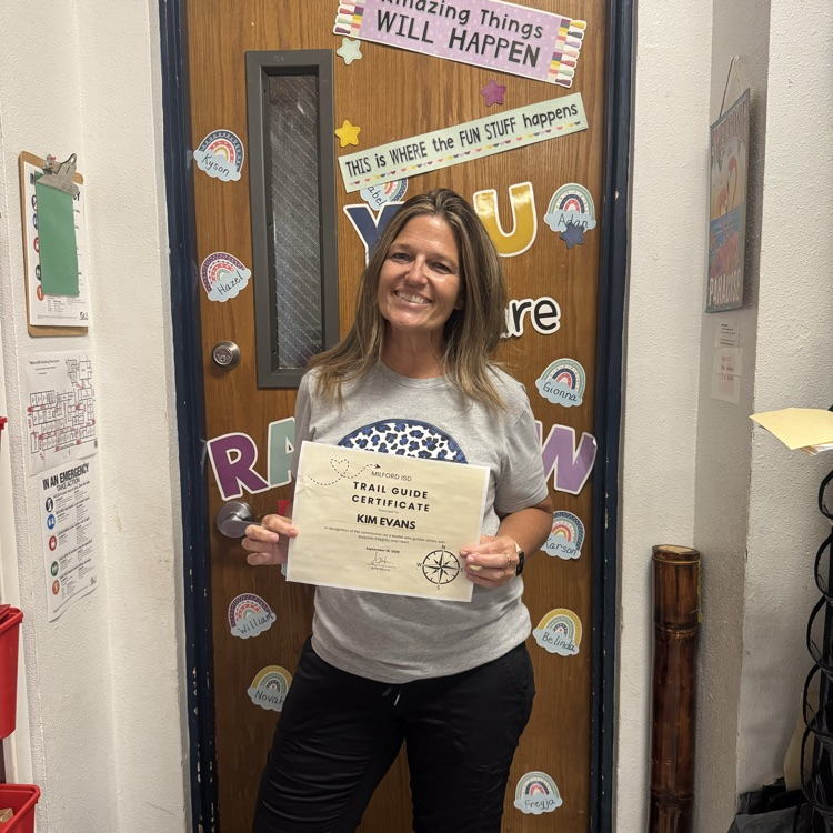 trail guide award given to Ms Evans