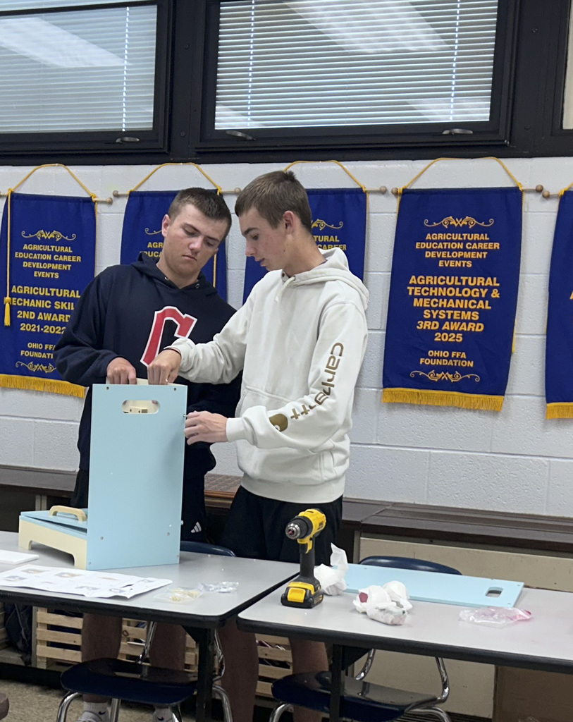 Ag Students assembling playset