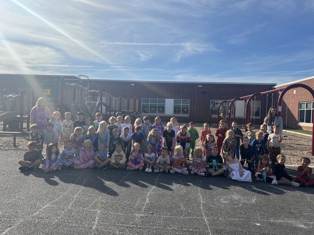 Kindergarten students playing on the playground in their pajama's!