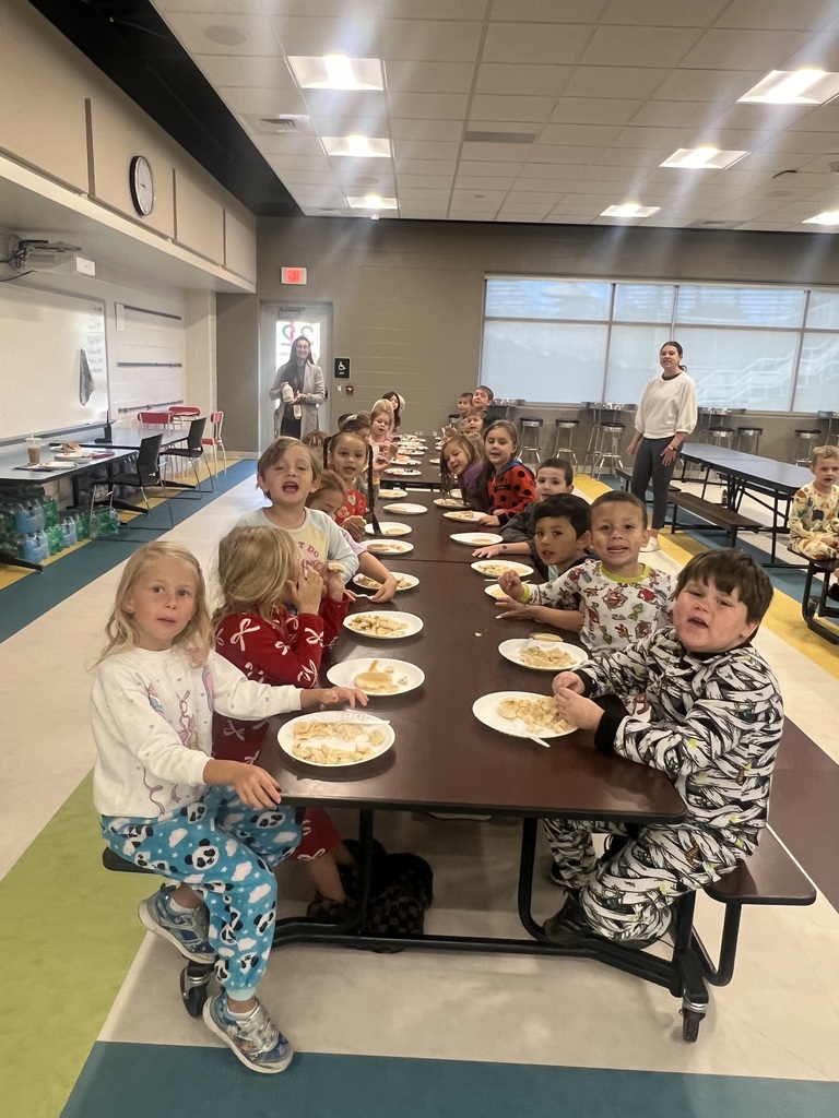 Mrs. Troutman's students enjoying pancakes in their pajamas!