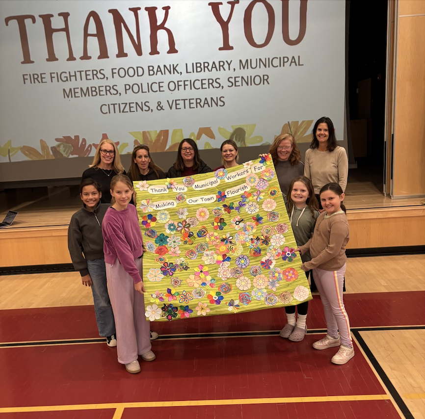 Municipal Employees holding a thank you poster