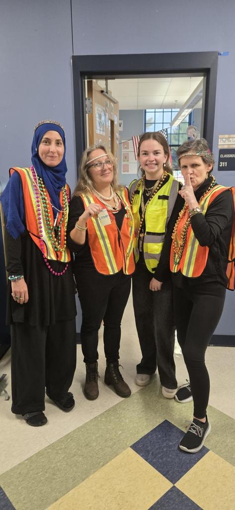 Cunningham French teachers dressed as jewel thieves for Halloween