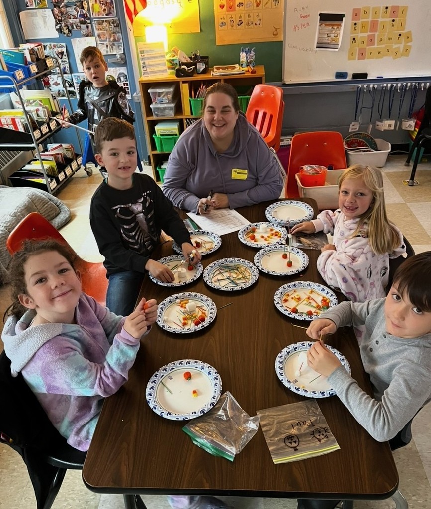 parent volunteer helping with project