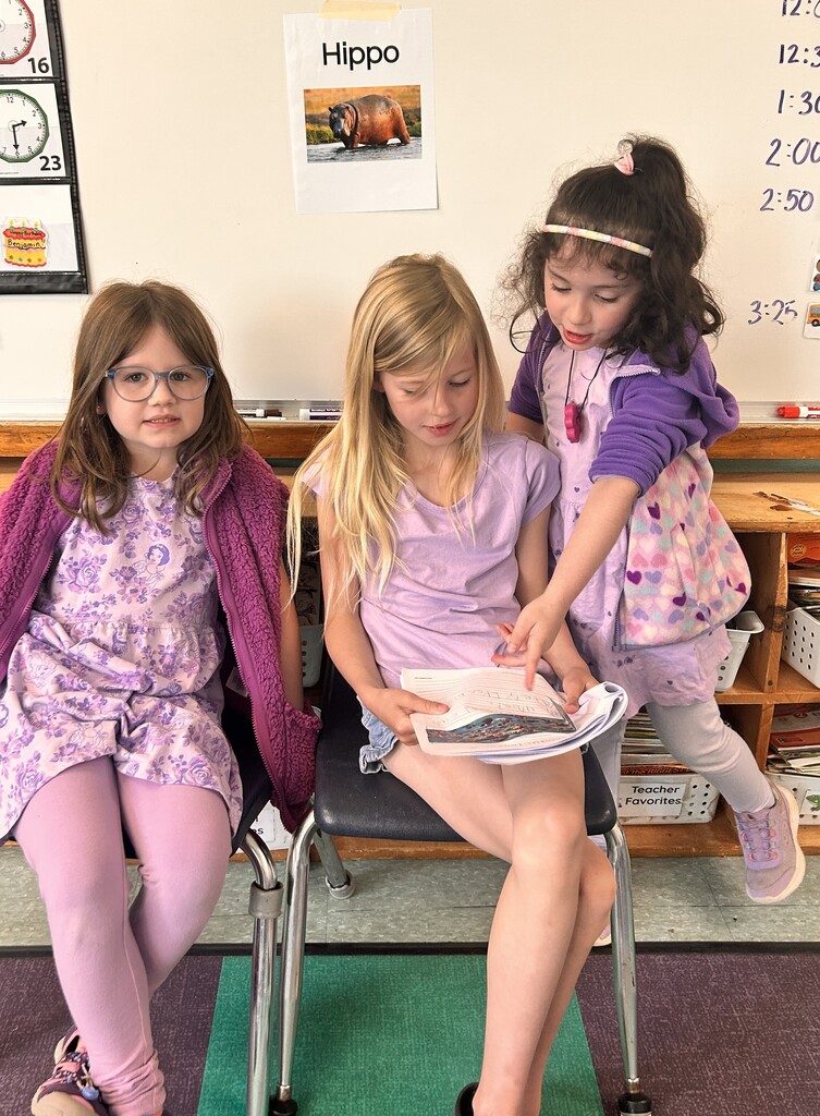 Students reading together.