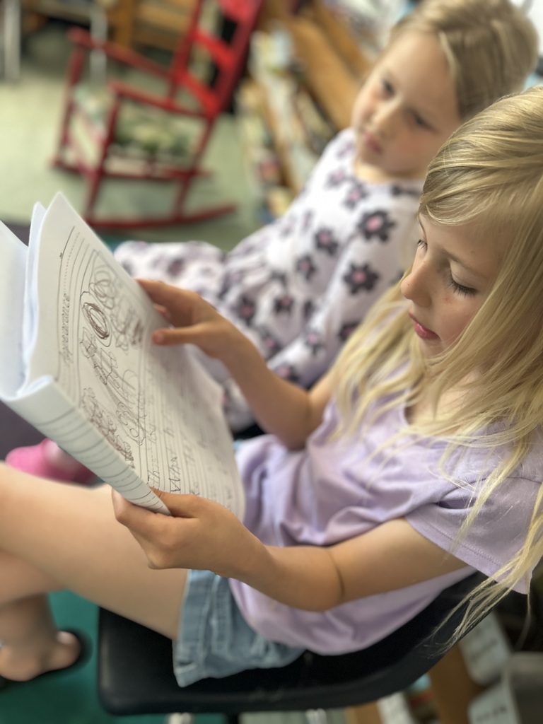 Student reading their writing.