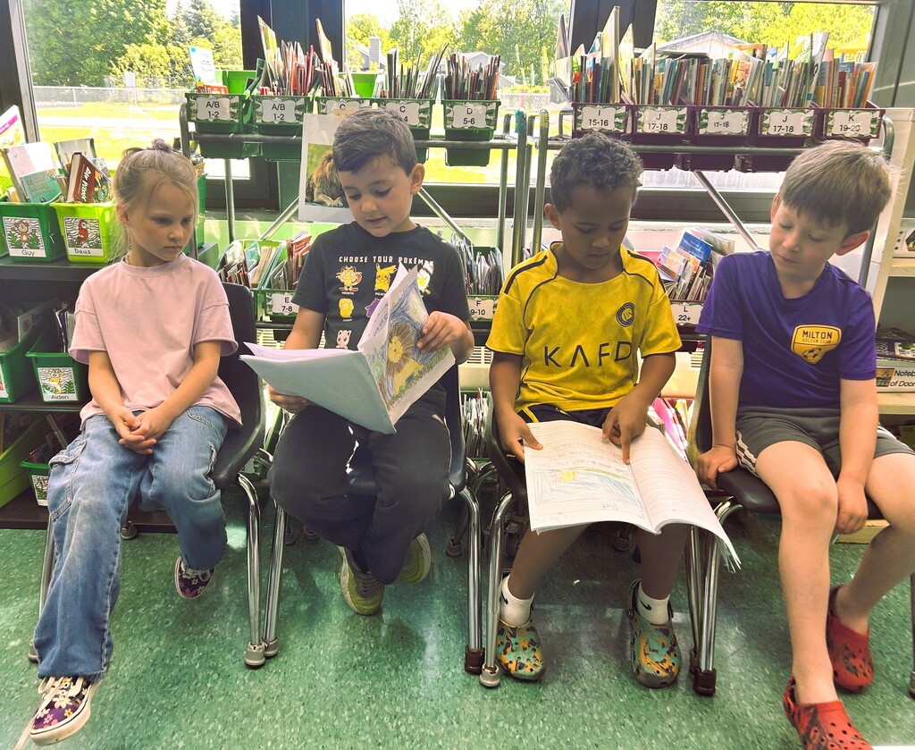 Students reading together.