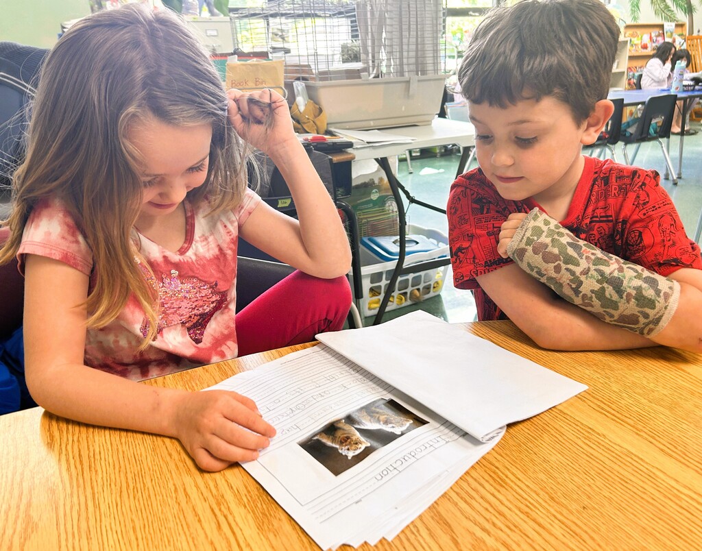 Students reading their writing.