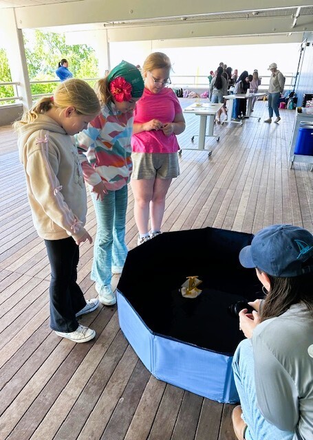 students observing sailing