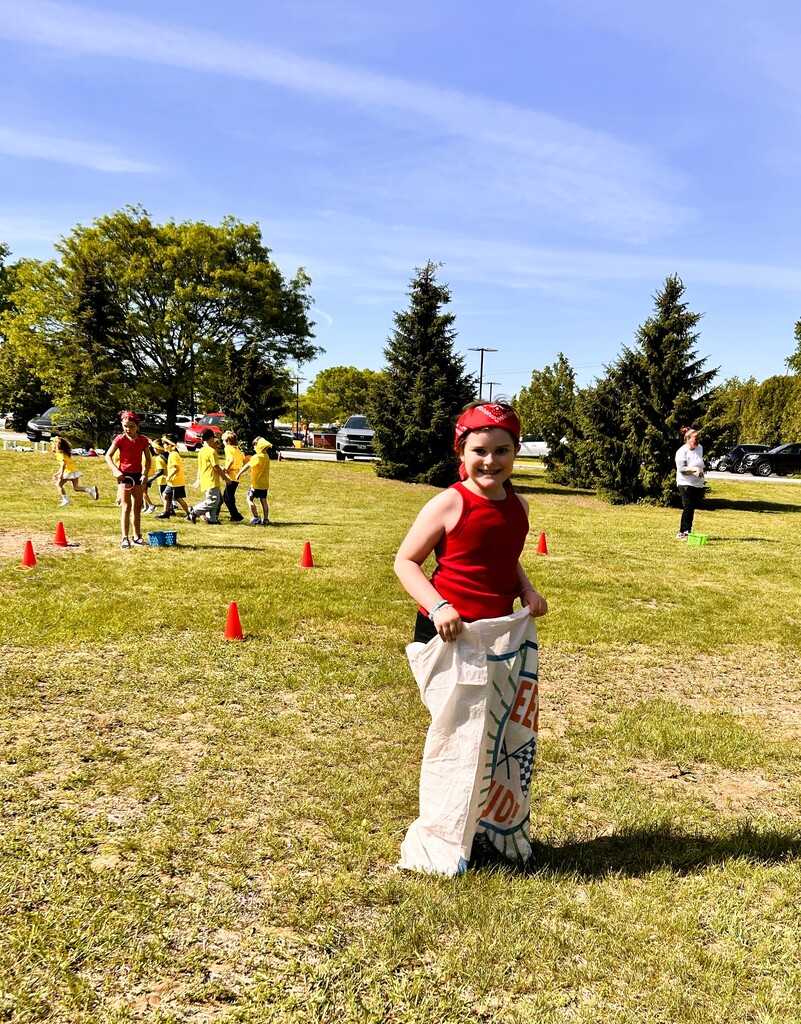 Student in sack race.
