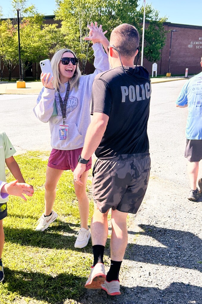 Giving high fives.