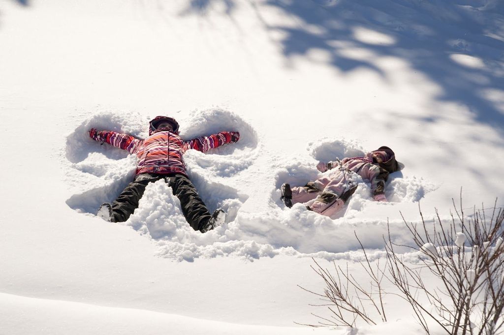 Students playing in the snow