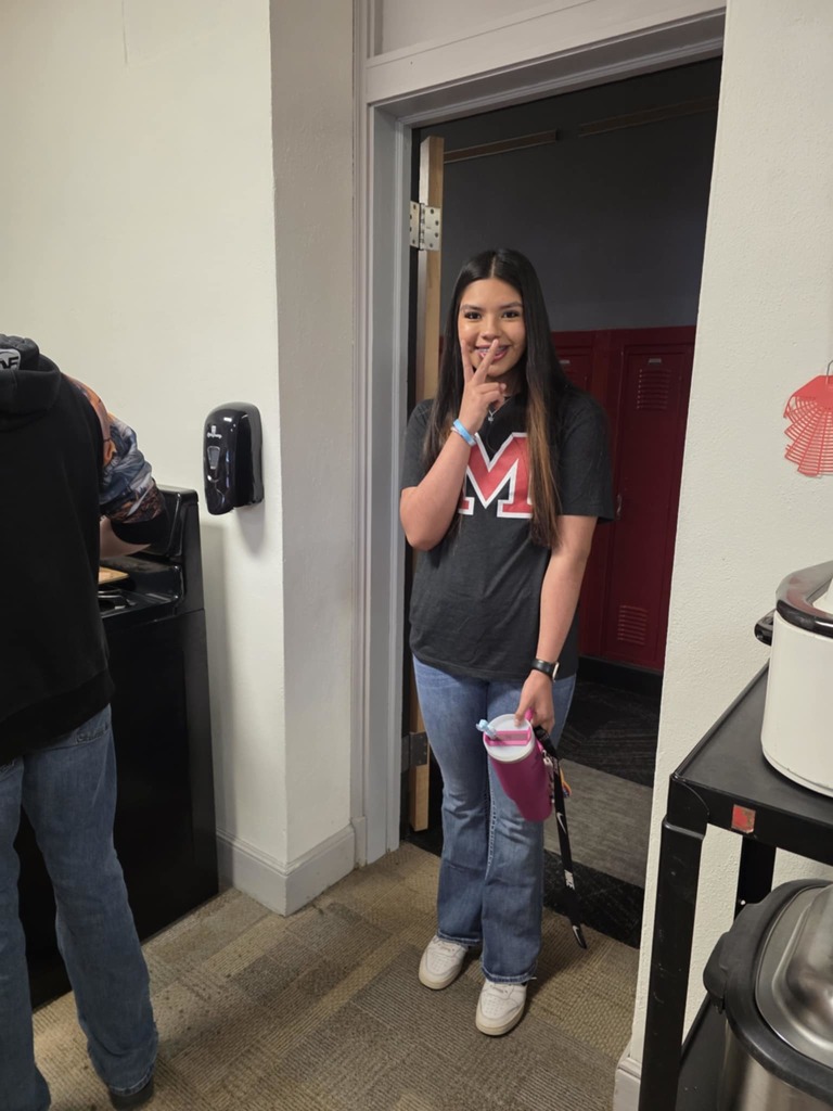 Liyah cookiing breakfast for FFA Staff breakfast