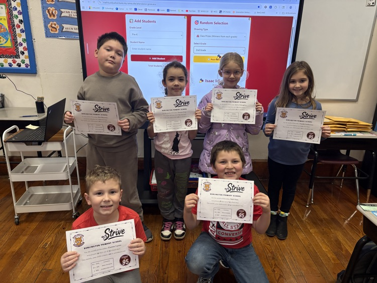 A photo of 2nd Graders with 95% and above for December. 