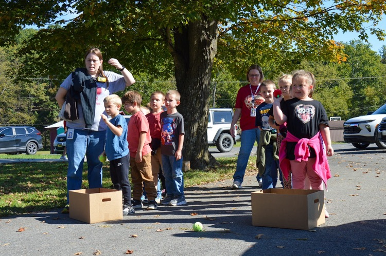 A photo of students playing Apple Toss.