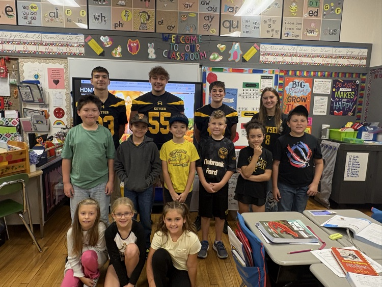 A photo of the 3rd grade  with the KHS student athletes. 
