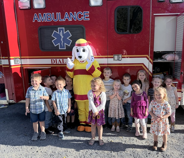 A photo of the Pre-K class in front of a fire truck for a Fire Safety presentation by the BVFD. 