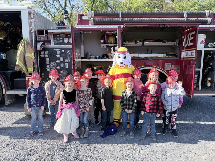 A photo of the Kindergarten class in front of a fire truck for a Fire Safety presentation by the BVFD. 