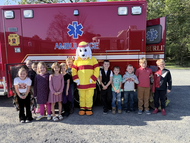 A photo of the 1st grade class in front of a fire truck for a Fire Safety presentation by the BVFD. 