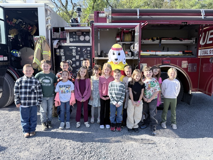 A photo of the 2nd grade class in front of a fire truck for a Fire Safety presentation by the BVFD. 