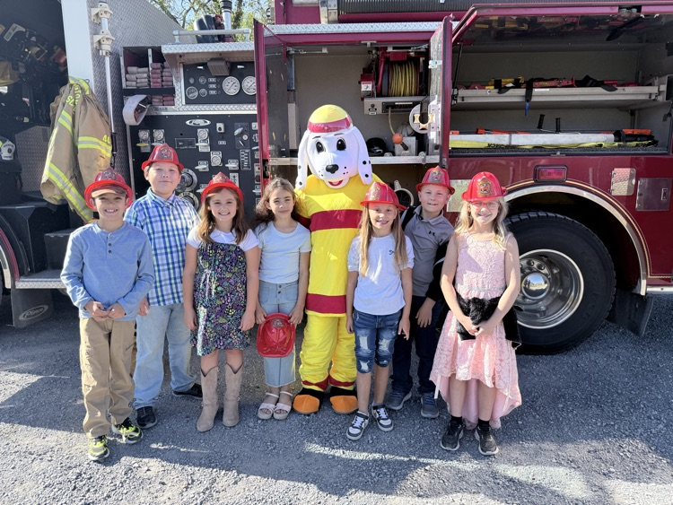 A photo of the 3rd grade class in front of a fire truck for a Fire Safety presentation by the BVFD. 