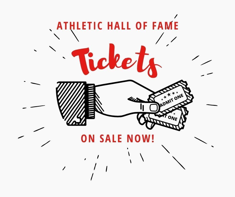 Hand holding two tickets