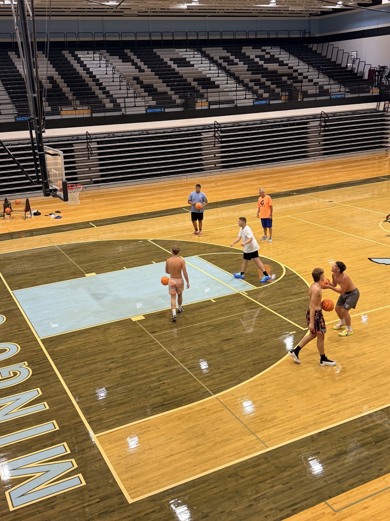 📸 Picture Description (Accessibility): Mingo Central basketball players are gathered inside the gym while the basketball court floor is being refinished. The team is working together during a flex day, showing their commitment and preparation for the upcoming basketball season despite the temporary changes in their practice environment. Coach Rob is with the team as they continue building chemistry and getting ready for another year of Miner basketball.