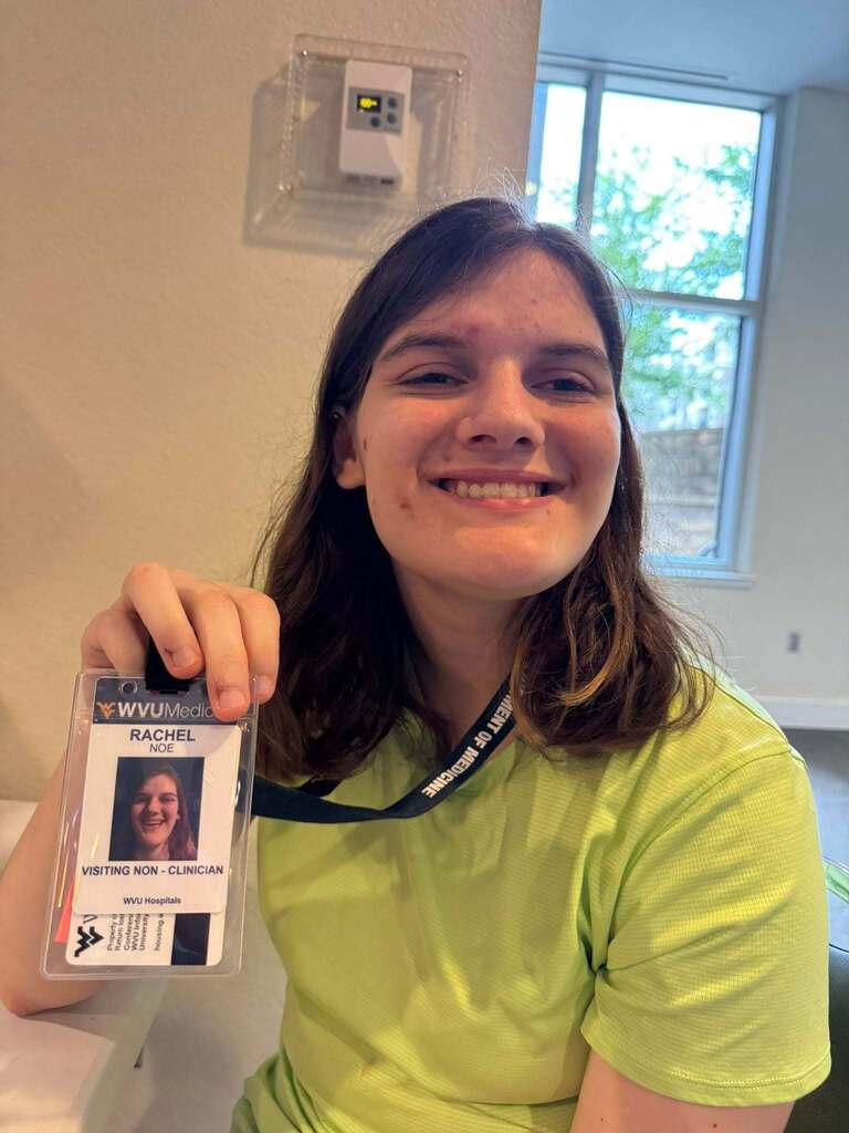 📸 Picture Description (Accessibility): Mingo Central student Rachel is pictured participating in Camp Med at West Virginia University. The week-long camp provided students interested in healthcare careers with opportunities to observe medical procedures, participate in clinical activities, and interact with physicians. The photo highlights Rachel’s exploration of the medical field and her commitment to learning about future career opportunities.