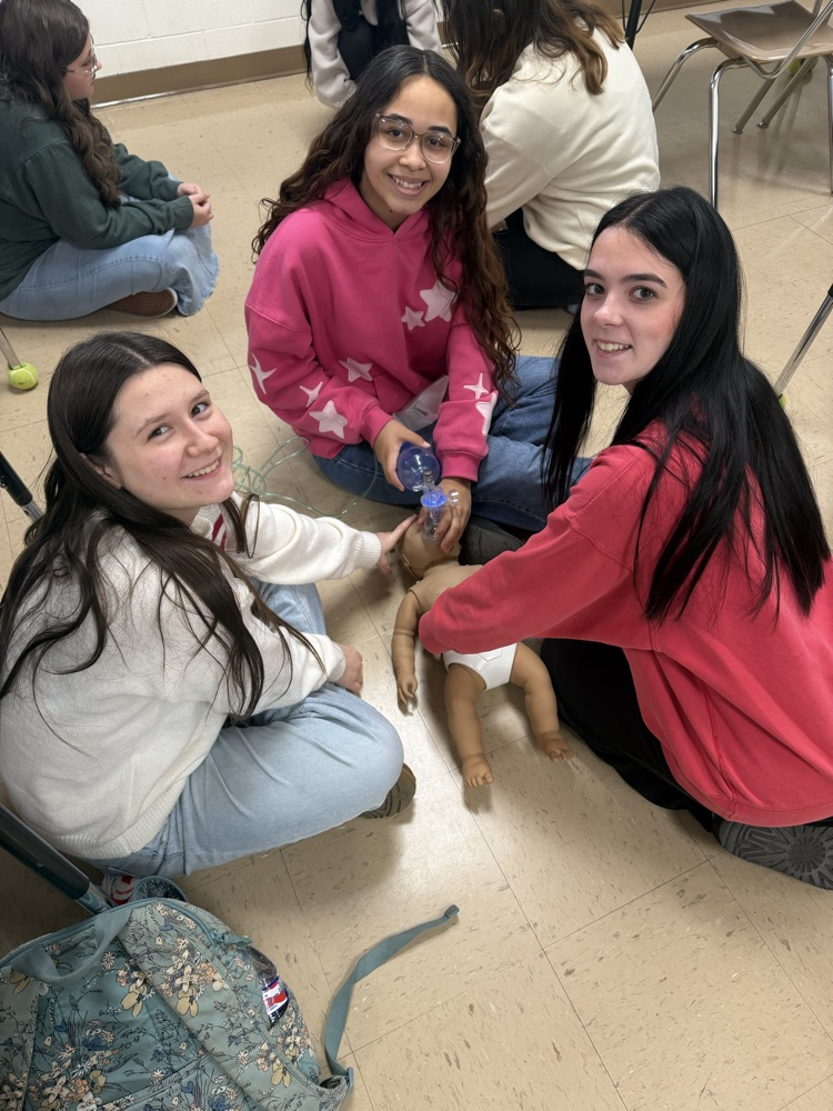health occ students doing CPR 