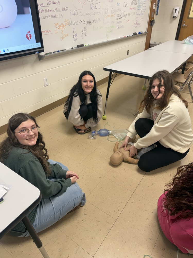 health occ students doing CPR 